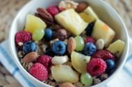 Pair nuts with fruit and yogurt for a healthy snack (Image via Pexels/Jeshoots)